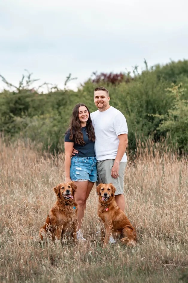 James and Jasmine Purell with their two golden retrievers — co-founders of Cravebox